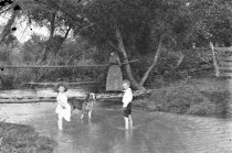 Crawford children playing in stream, c1892